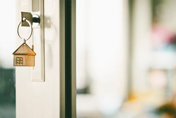 Why Renters Insurance is a Must for Laredo Residents - Beautiful Key in a Lock Opening the Doors of a Wooden House